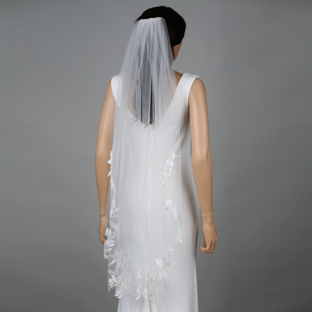 FS6229 bridal veil styled on mannequin, highlighting mid-length design.