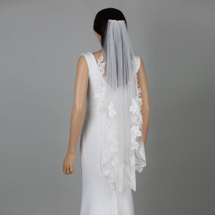 FS6231 cathedral veil styled with elegance on mannequin.