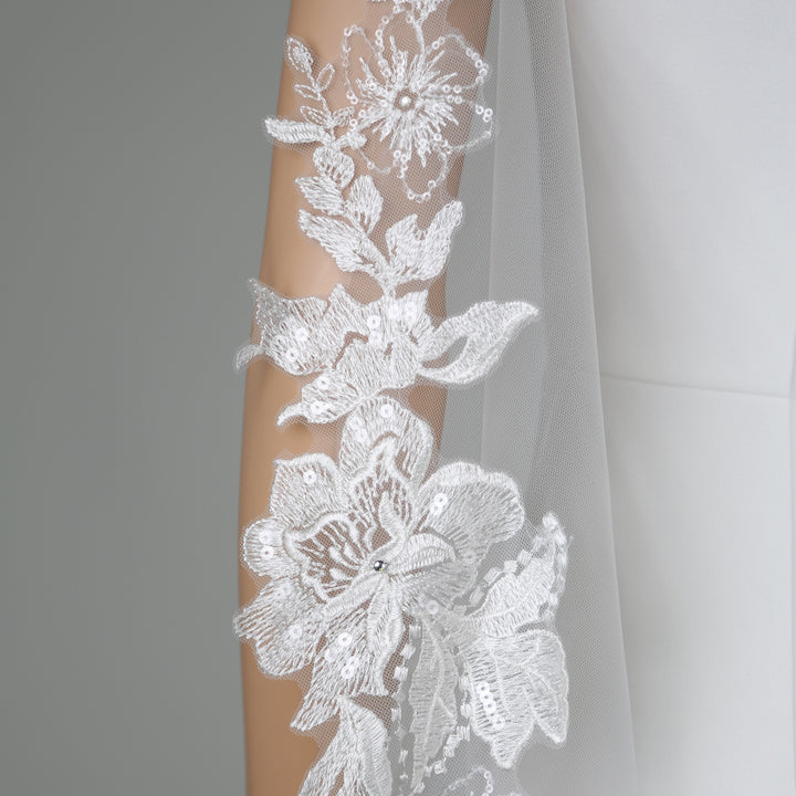 Side view of FS6231 showcasing scalloped lace edges and dramatic flow.