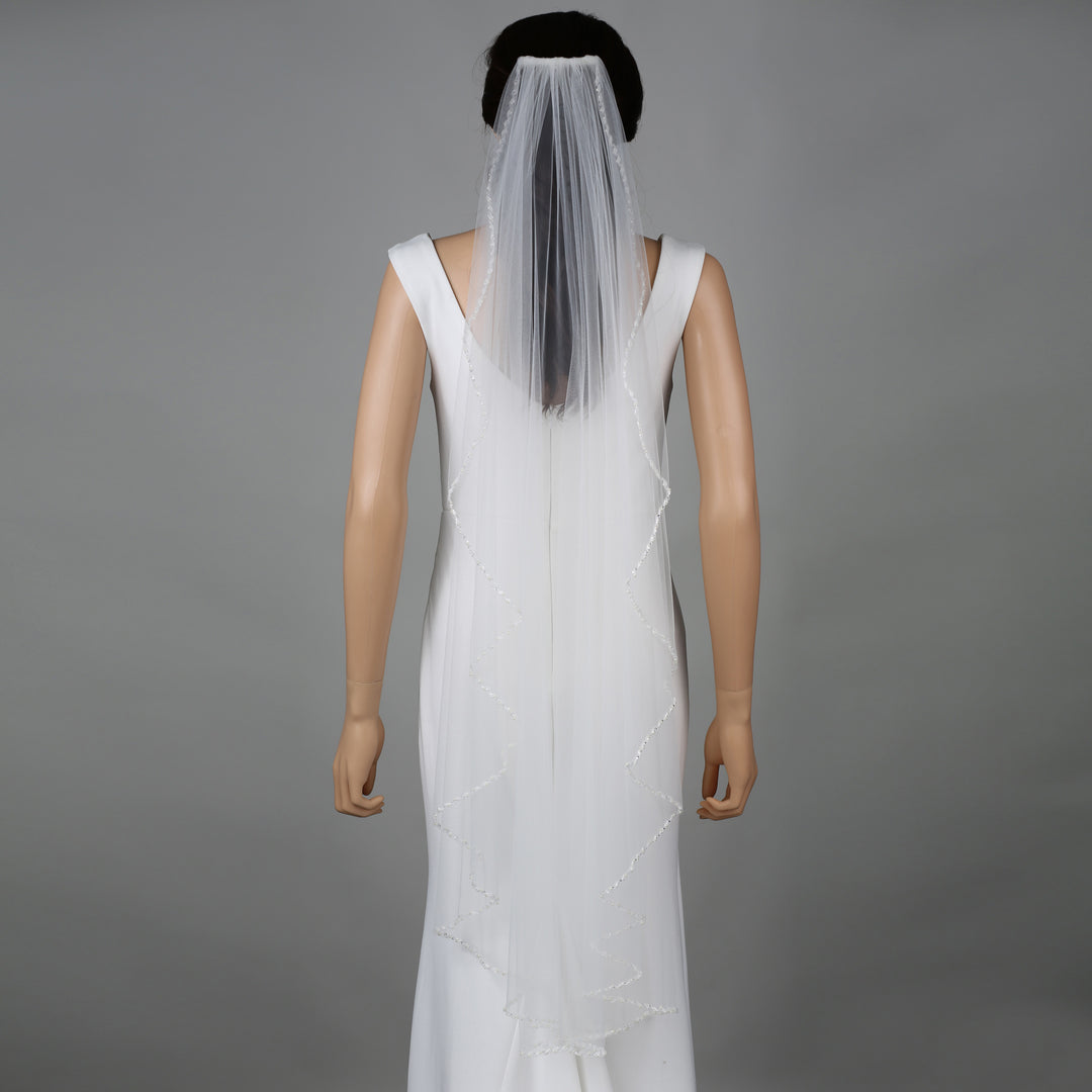 FS6238-AC bridal veil styled on mannequin, highlighting chapel-length design.