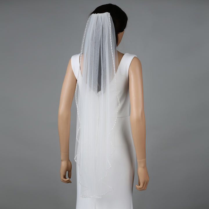 FS6238 bridal veil styled on mannequin, highlighting chapel-length design.