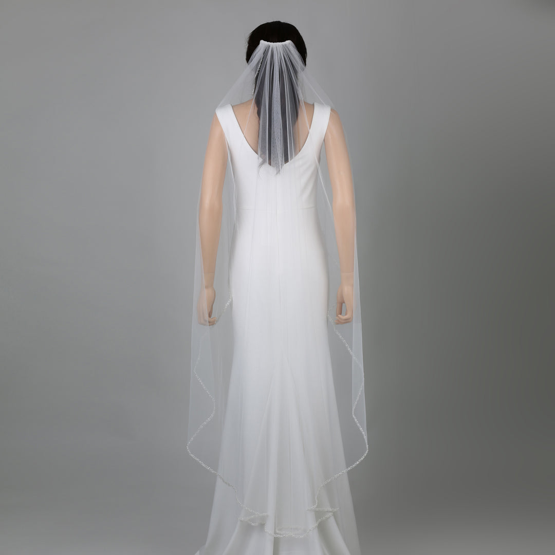 FS6243-AC chapel-length bridal veil with intricate lace embroidery, full-length view.