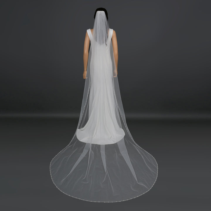 Side view of FS6244 showcasing scalloped lace edges and elegant flow.