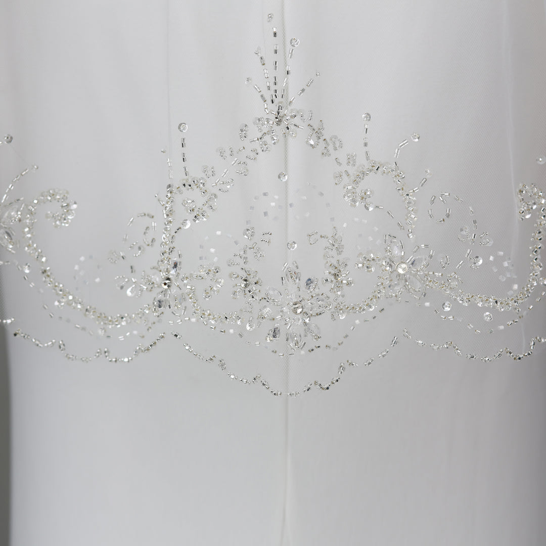 FS6252 side view showcasing flow and scalloped lace edges.