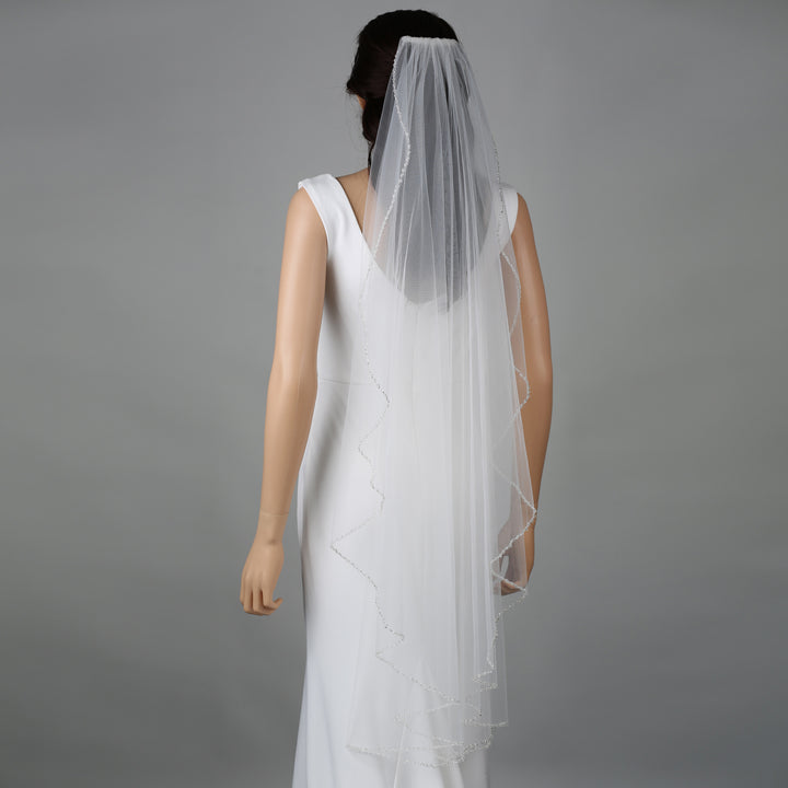 FS6257-AC bridal veil styled on mannequin, highlighting chapel-length design.