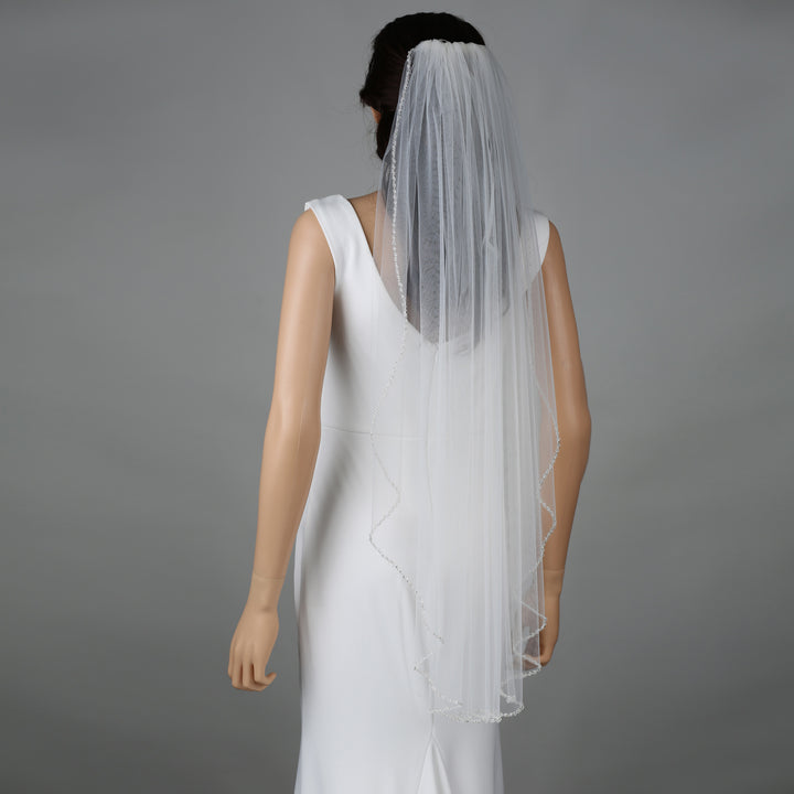 FS6257 bridal veil styled on mannequin, highlighting mid-length design.