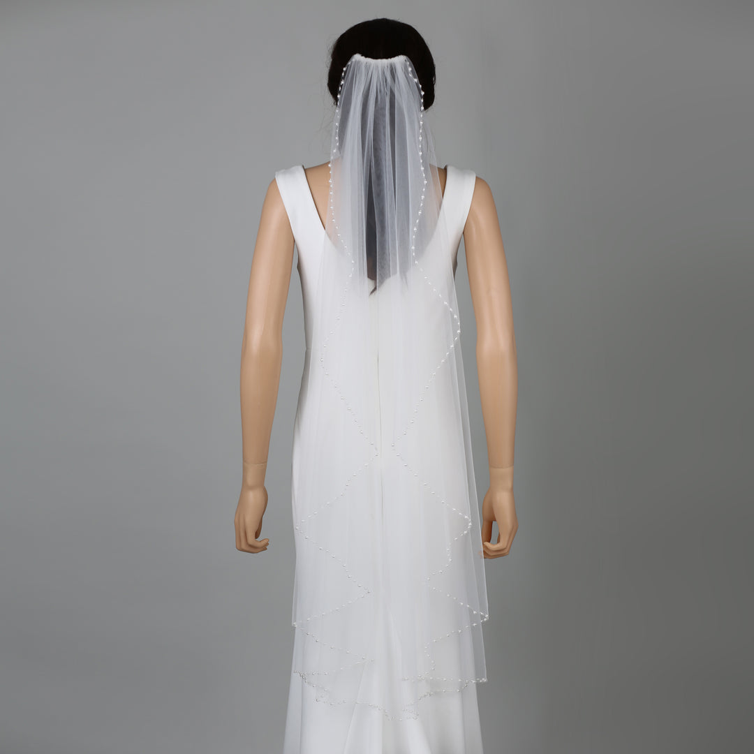 FS6259-AC bridal veil styled on mannequin, highlighting mid-length design.