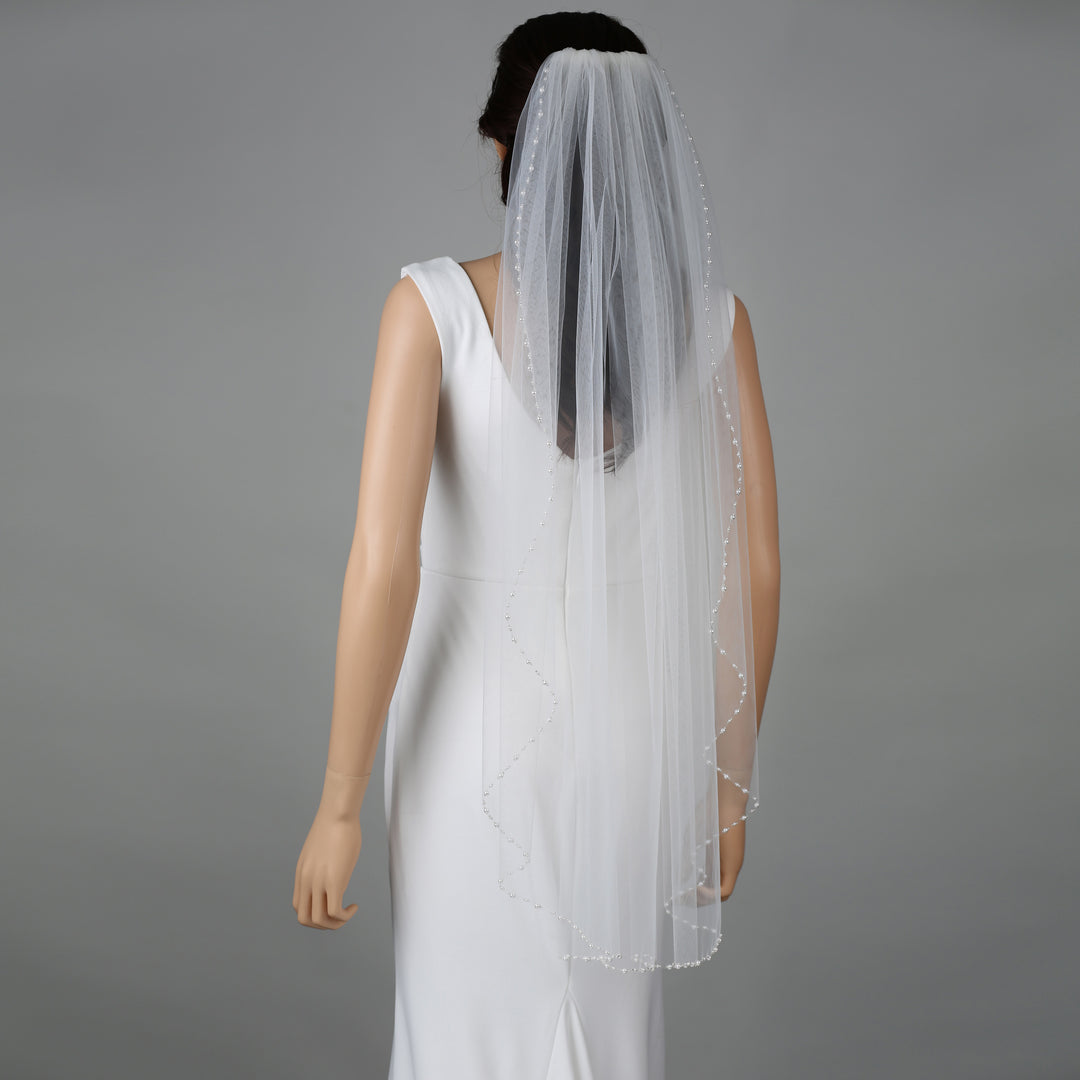 FS6259 bridal veil styled on mannequin, highlighting mid-length design.