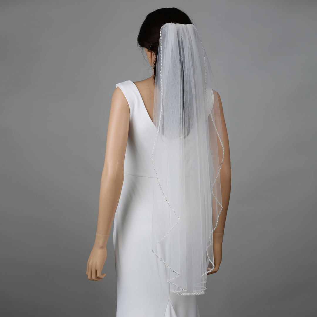 FS6262 bridal veil styled on mannequin, highlighting chapel-length design.