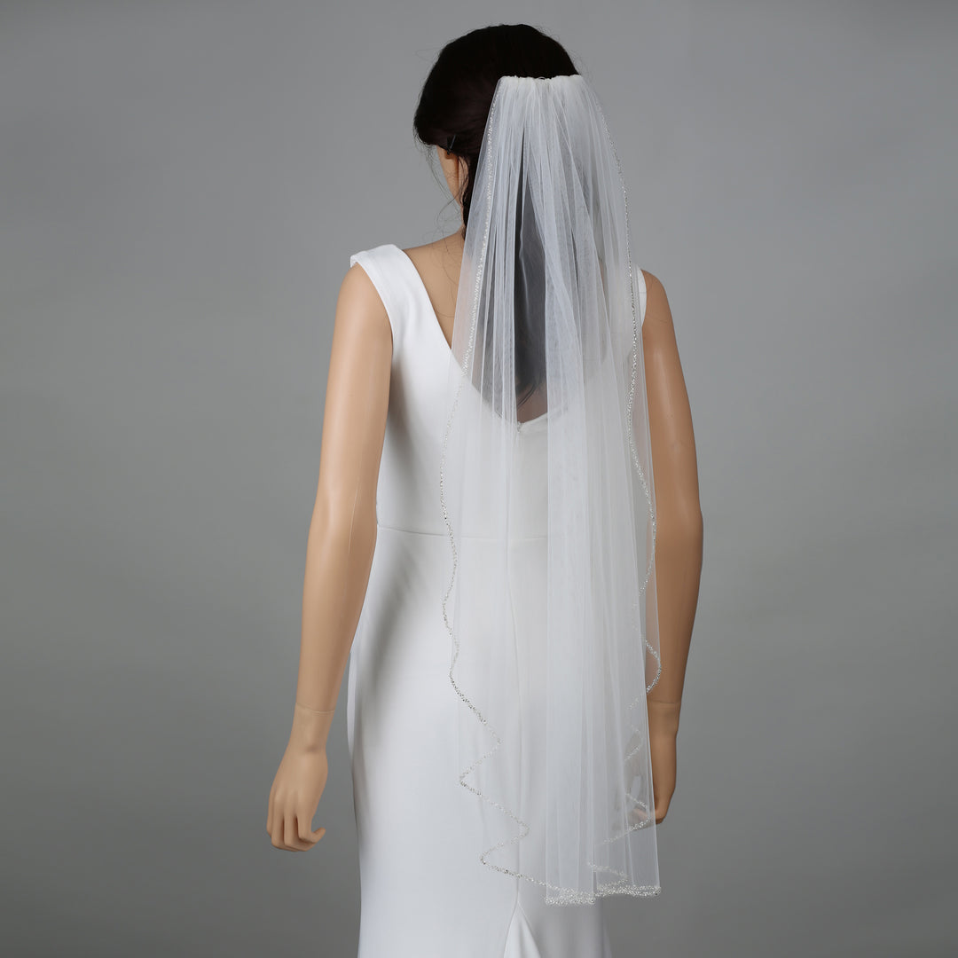 FS6264 bridal veil styled on mannequin, highlighting chapel-length design.