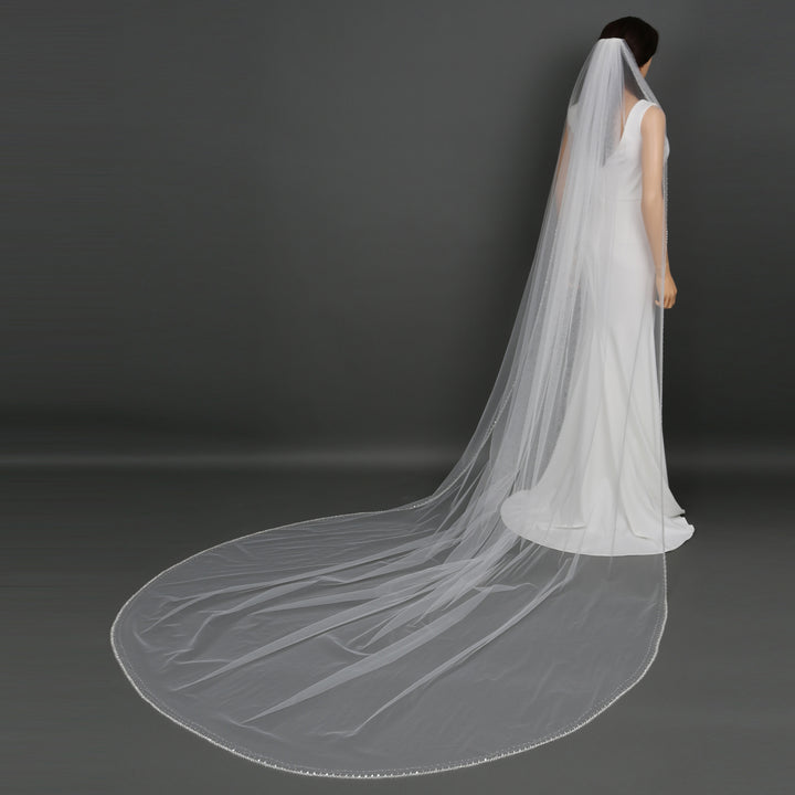 Side view of FS6274 showcasing scalloped lace edges and elegant flow.