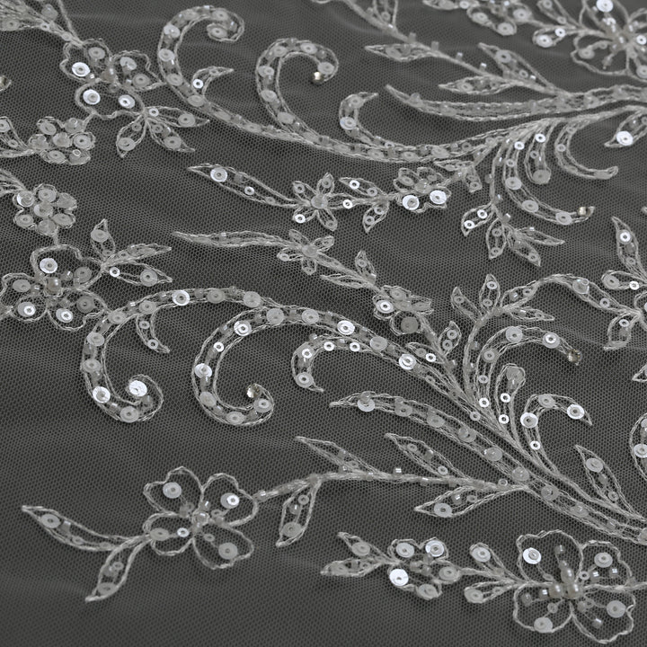 Close-up of FS6298 floral lace edges with rhinestone accents.