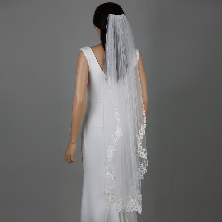 FS6305 chapel-length bridal veil with intricate floral embroidery, full-length view.