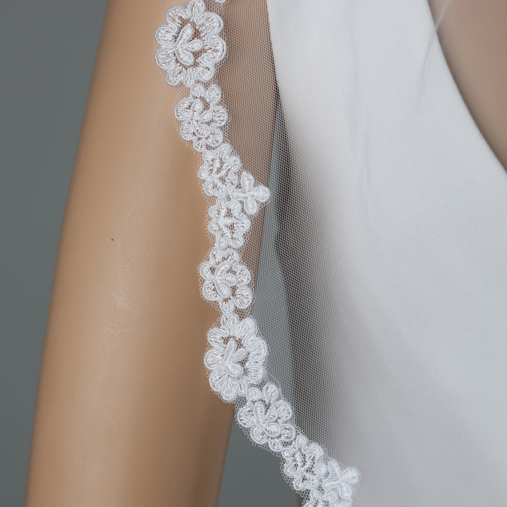 Close-up of FS6316-M lace embroidery with bead and rhinestone details.