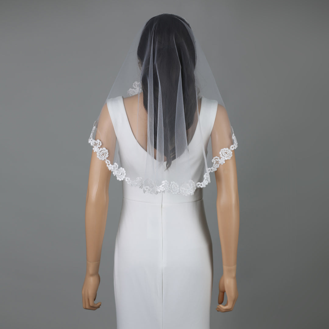 FS6317-M bridal veil styled on mannequin, highlighting mid-length design.