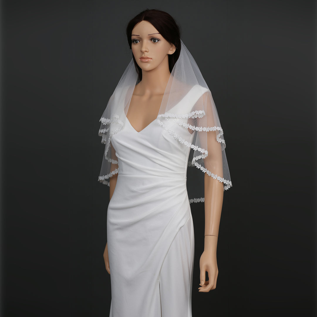 Side view of FS6318 veil showcasing scalloped edges and intricate detailing.