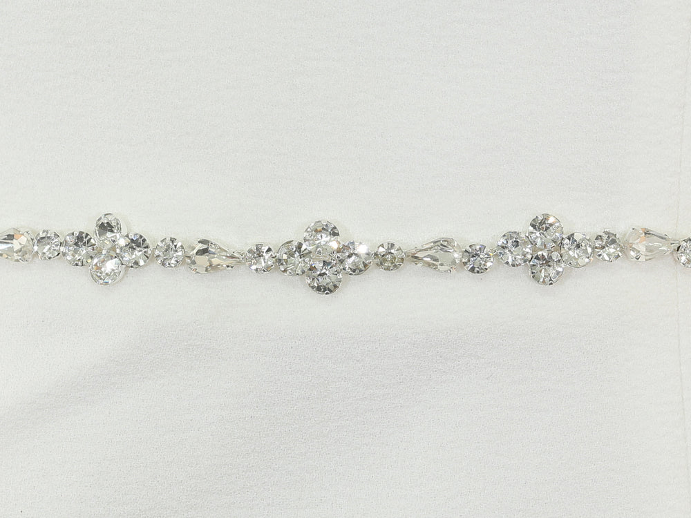 Close-up of S1002 detailing with rhinestones and pearls.