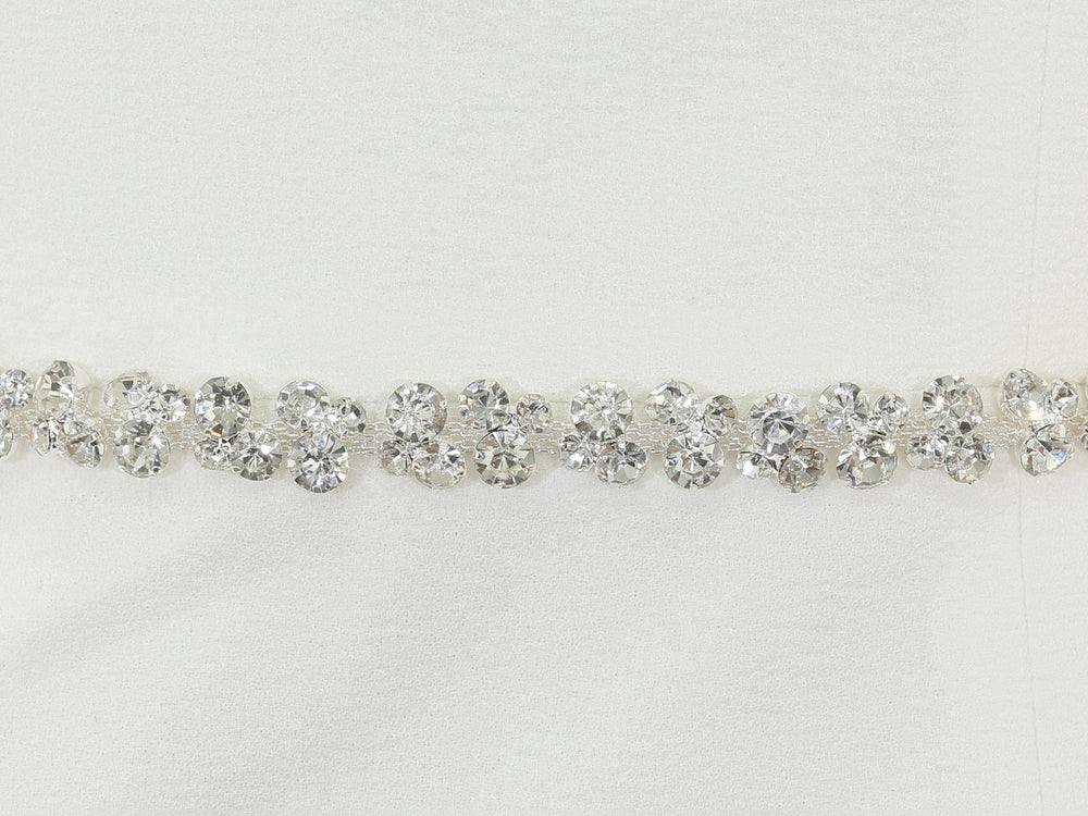 Close-up of S1014 detailing with bead and rhinestone embellishments.